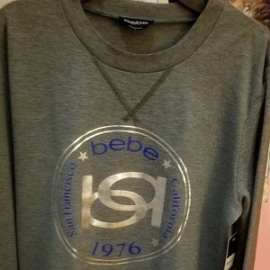 Bebe long sleeve Top sz. M